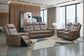 Keldon - Reclining Console Loveseat - Brown