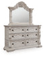 Bruchandi King Upholstered Panel Bed with Mirrored Dresser