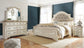 Realyn Three Drawer Night Stand