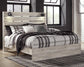 Cambeck King Panel Bed with Mirrored Dresser