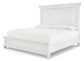 Kanwyn King Panel Bed with Mirrored Dresser, Chest and Nightstand