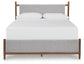Lyncott Queen Upholstered Bed with Mirrored Dresser