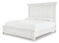 Kanwyn King Panel Bed with Mirrored Dresser