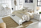 Kanwyn Queen Panel Bed with Storage with Mirrored Dresser, Chest and Nightstand