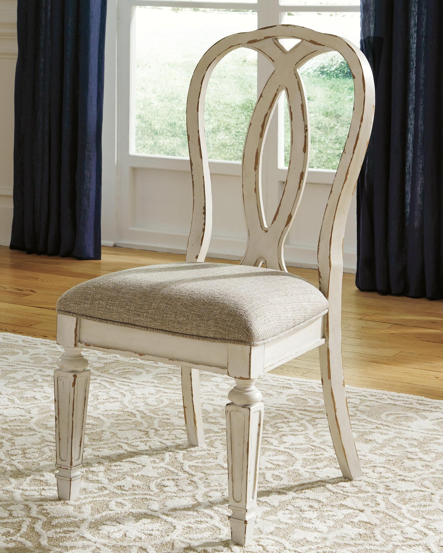 Realyn Dining Table and 8 Chairs