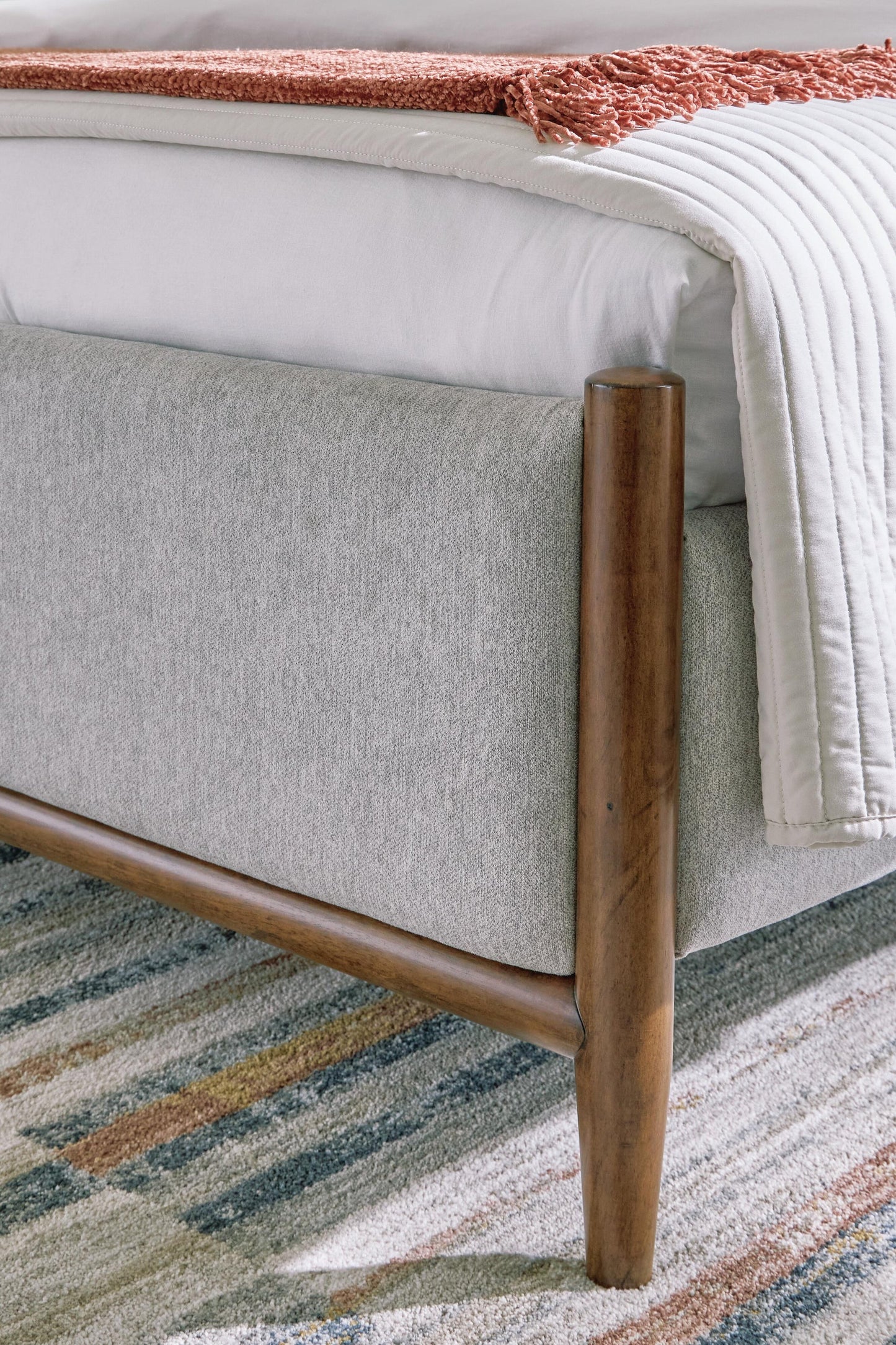 Lyncott California King Upholstered Bed with Mirrored Dresser