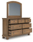 Vandenmore Queen Storage Sleigh Bed with Mirrored Dresser