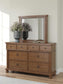 Chadworth King Poster Bed with Mirrored Dresser and Nightstand